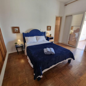 Casa Flores - casa espaçosa com churrasqueira e quintal